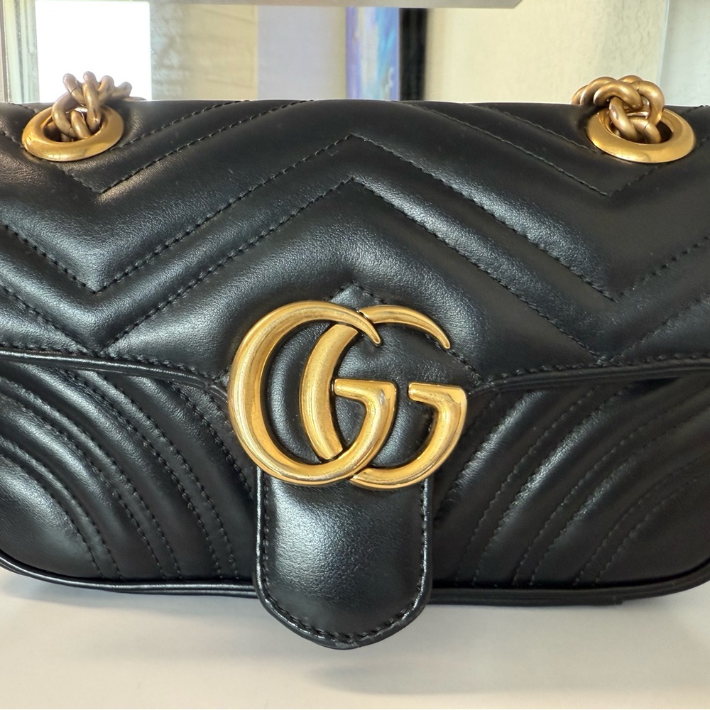Black Leather Bag with Gold Accents